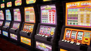 Pachinko board with ball drop landing on multiplier segment